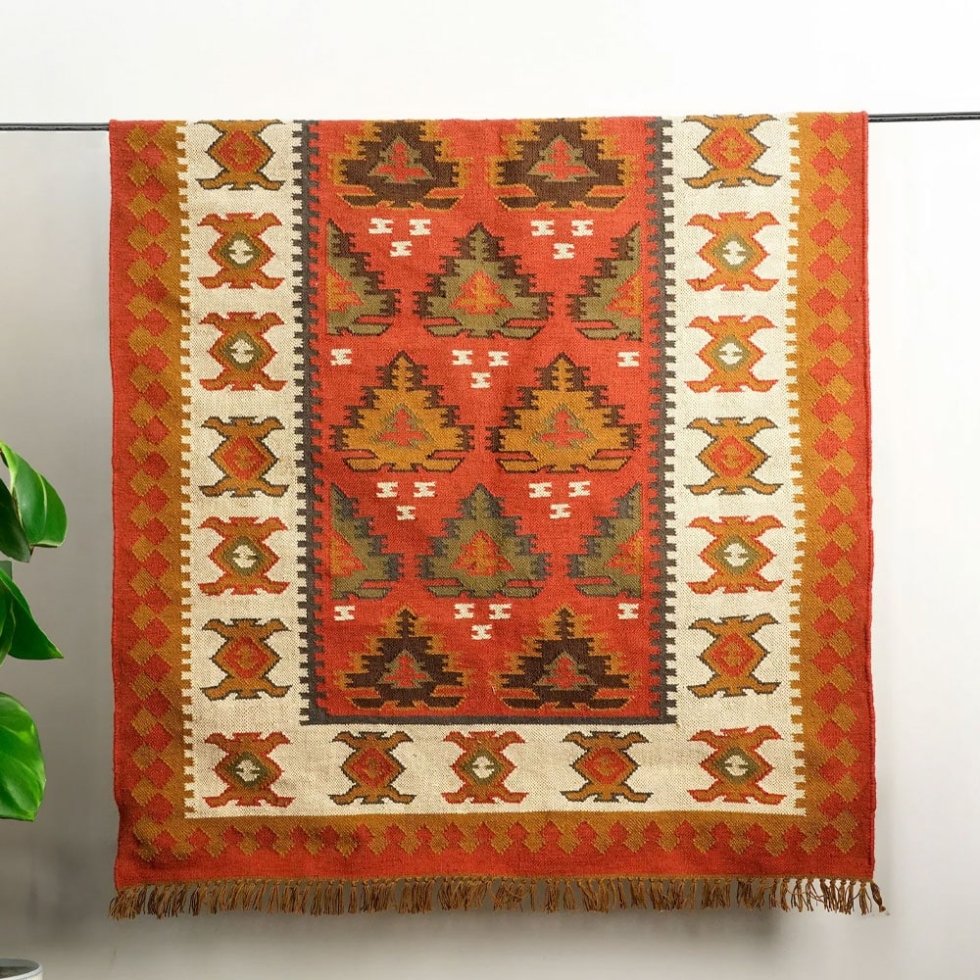 Op kerst geïnspireerd indisch kilim vloerkleed