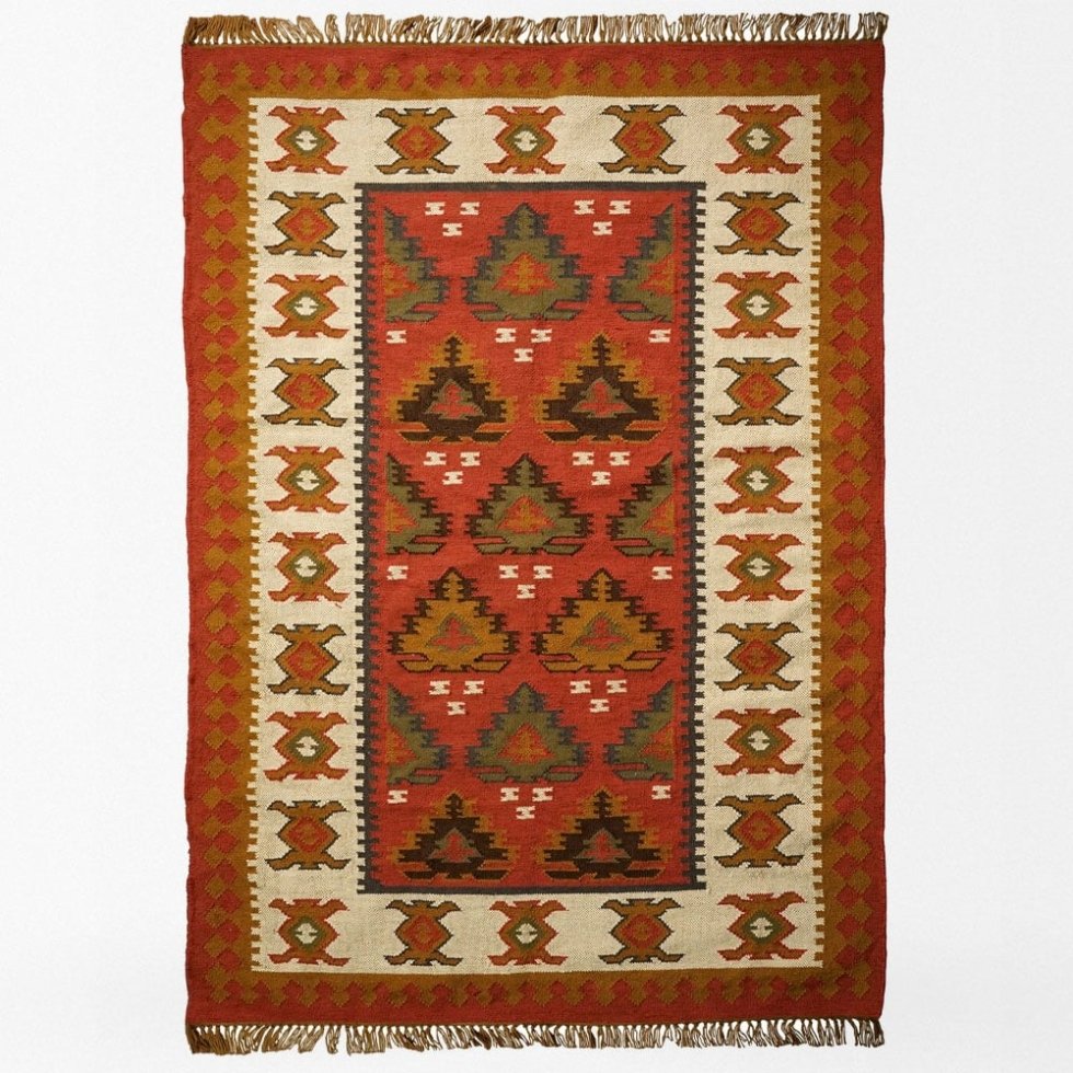 Op kerst geïnspireerd indisch kilim vloerkleed